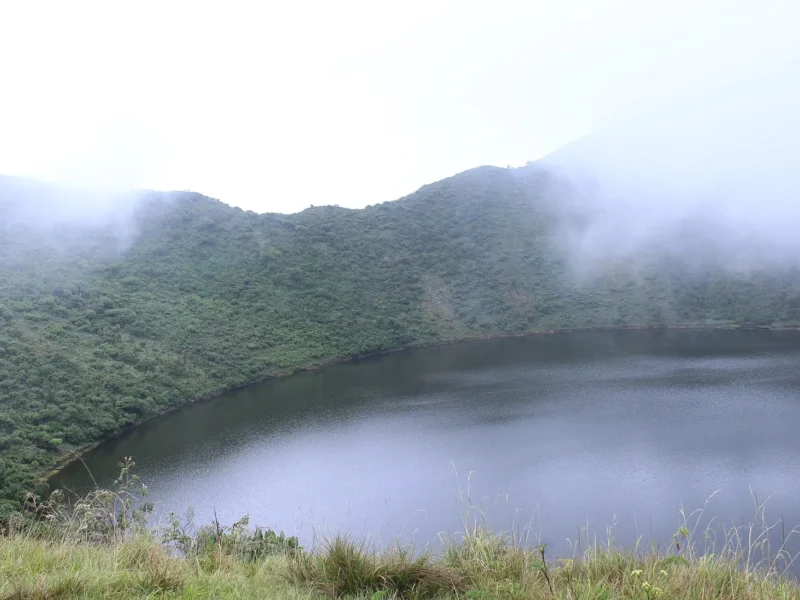 The crater lake at the summit of Mount Bisoke