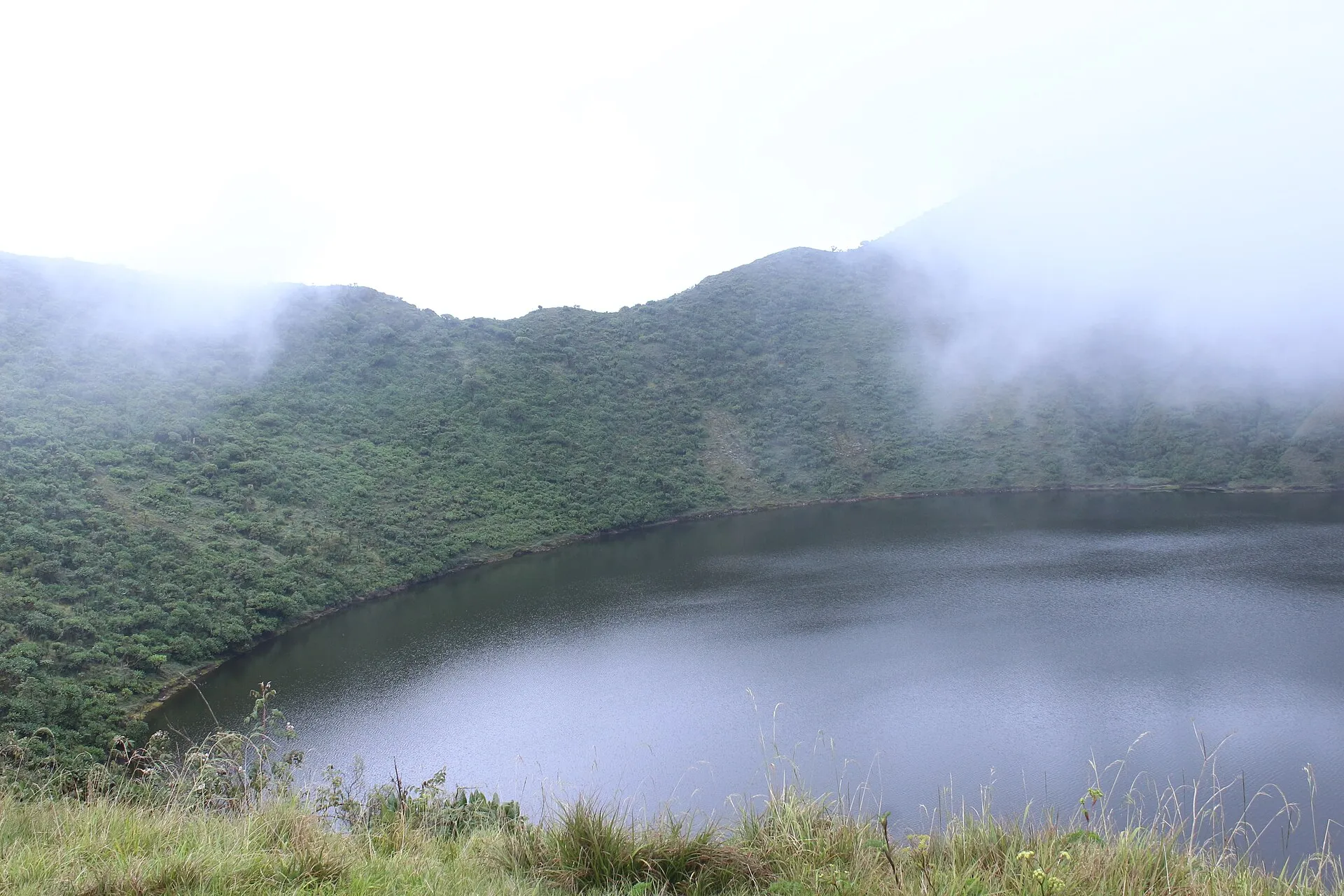 The crater lake at the summit of Mount Bisoke