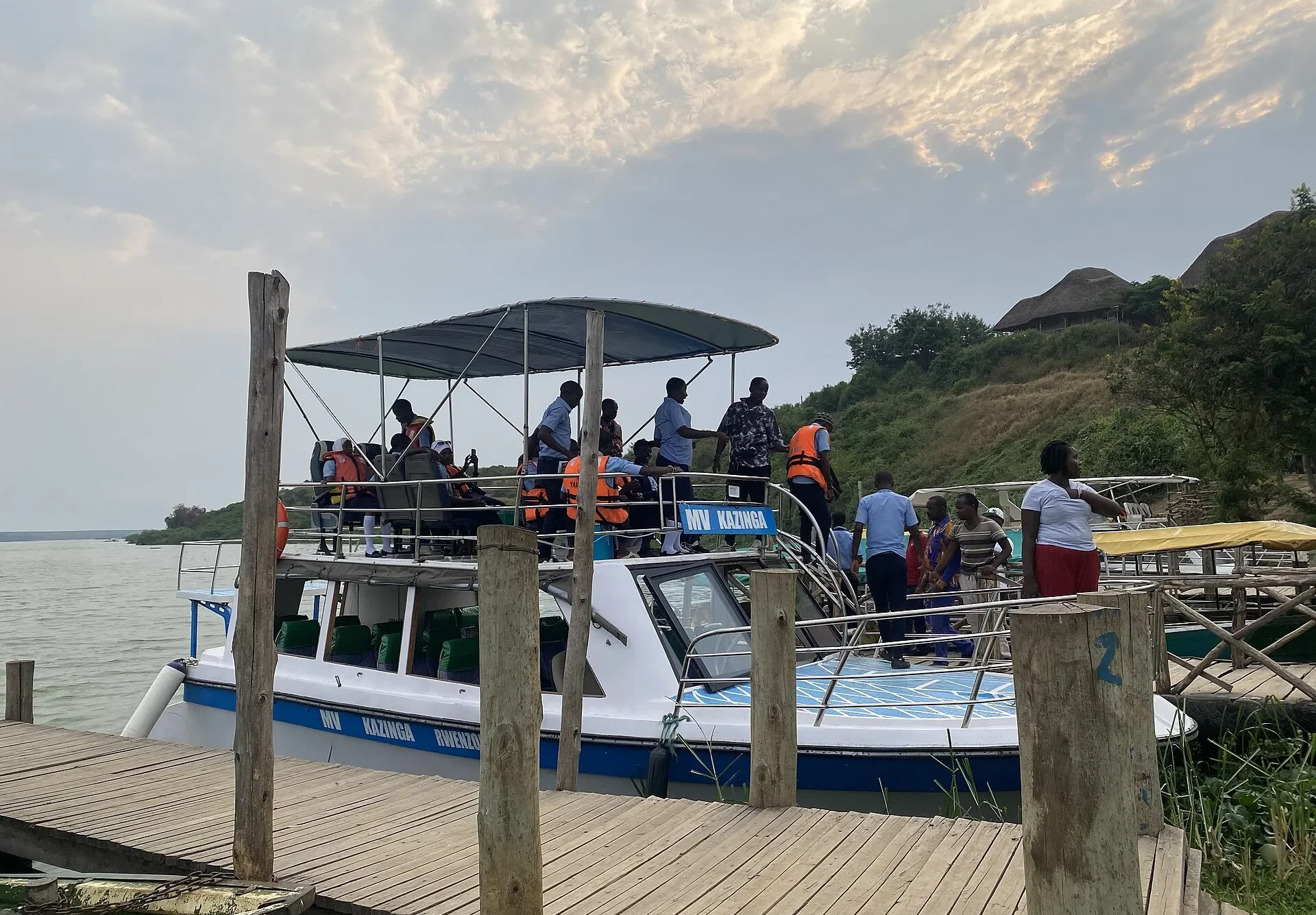 Visitors boarding a launch boat on the Kazinga Channel