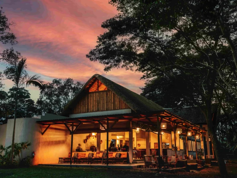 Main lodge at Adrift River Club at dusk