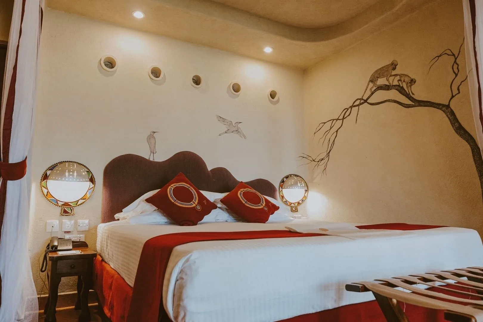 Double room with Maasai-inspired murals at Amboseli Serena Safari Lodge