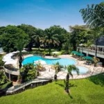 Gardens and pool at Lake Kivu Serena Hotel