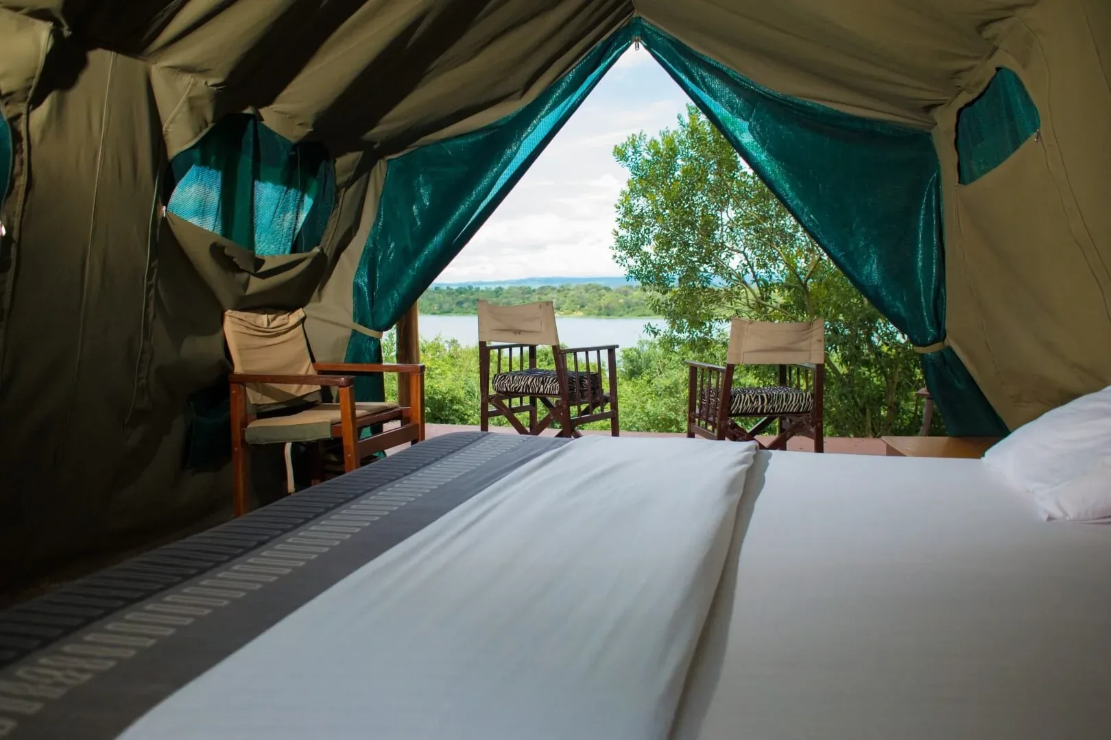 Safari tent at Queen Elizabeth Bush Lodge looking out over the water