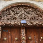 An intricately carved wooden door in Stone Town, Zanzibar
